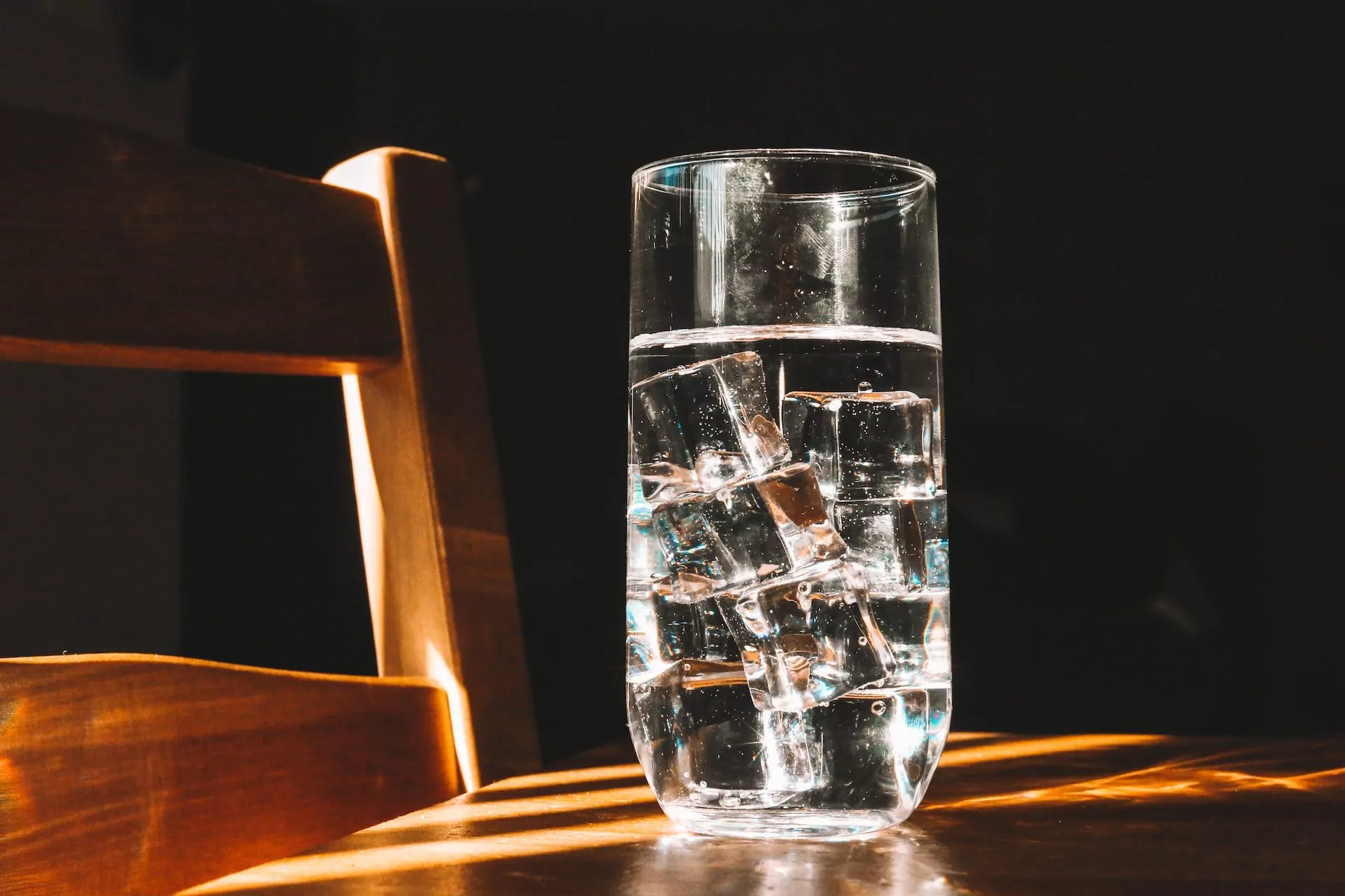 glass cup filled with ice water